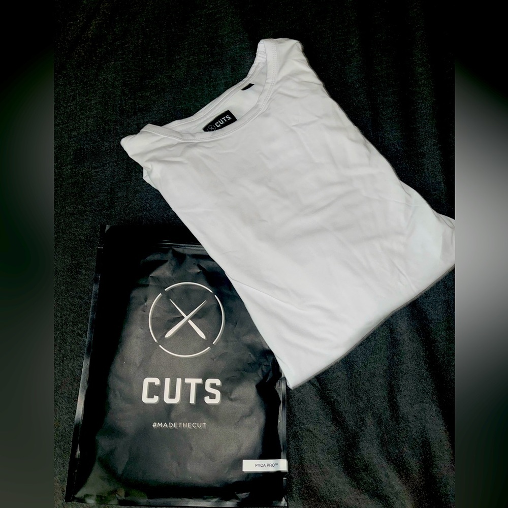 Brand new with package.  CUTS Long sleeve t-shirt